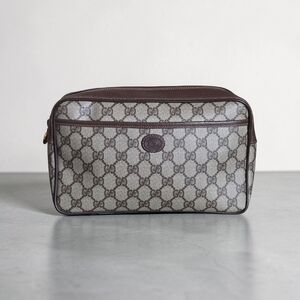 Authentic Gucci Beige and Brown GG Monogram Toiletry Pouch